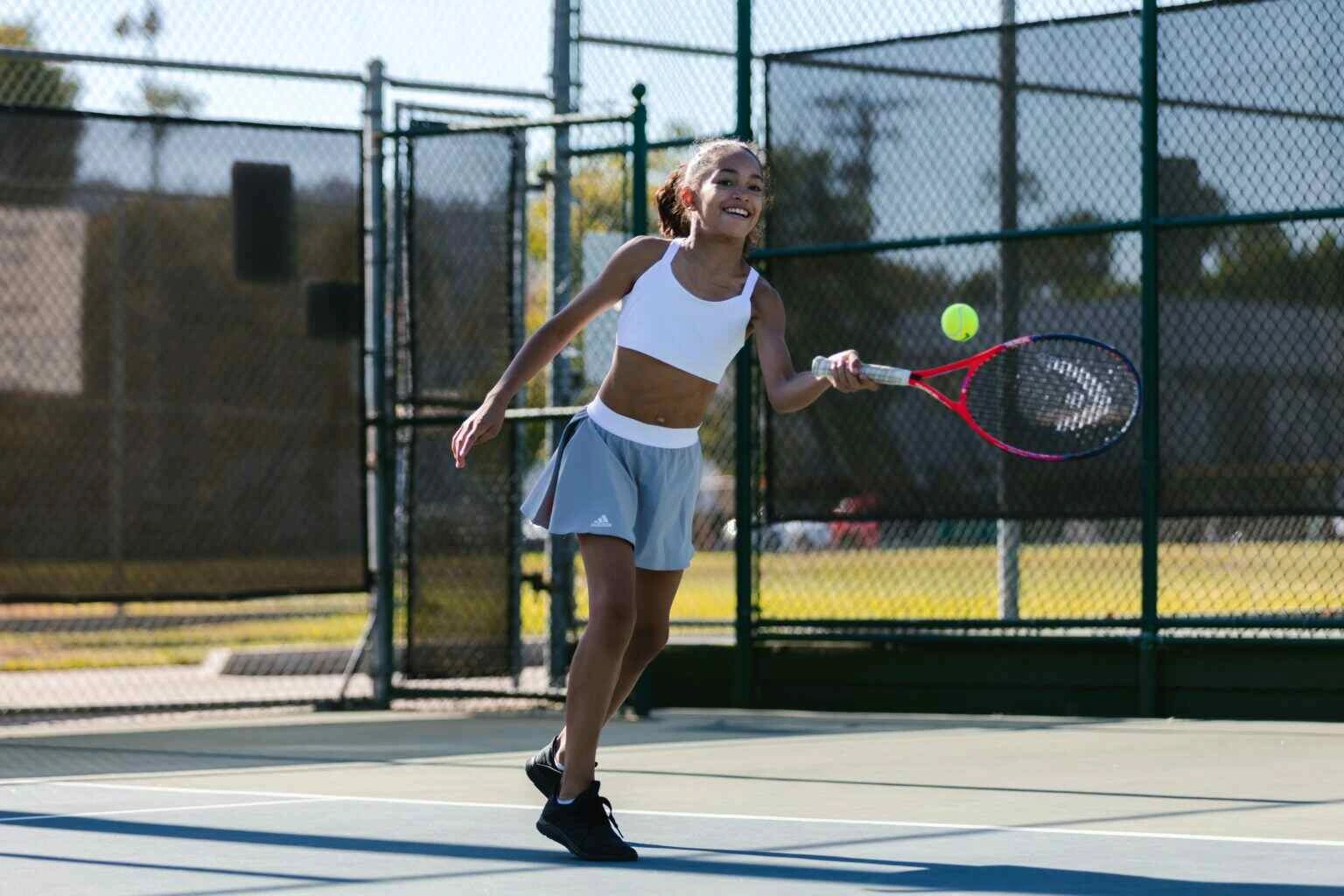 Girl playing Tennis
